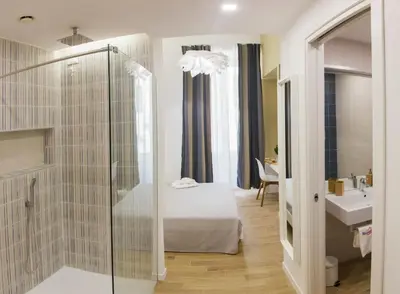 Letto o letti in una camera di Napolinn