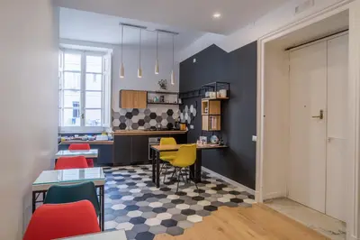 Area soggiorno di Napoliamo Guest House