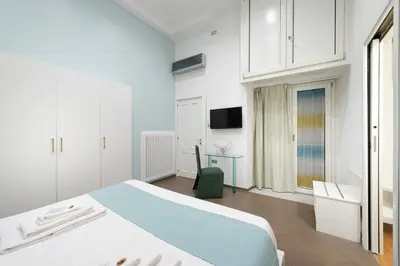 Letto o letti in una camera di domusvelata