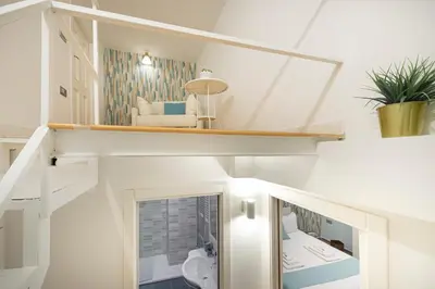 Letto o letti in una camera di domusvelata