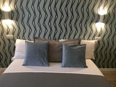 Letto o letti in una camera di Ambra Noblesse