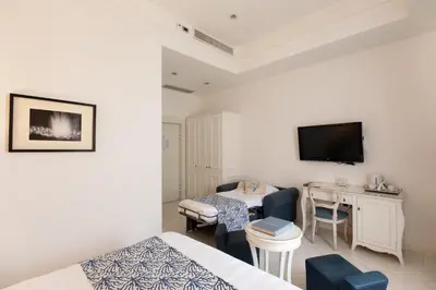 TV o dispositivi per l'intrattenimento presso La Ciliegina Lifestyle Hotel