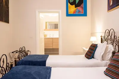 Letto o letti in una camera di Domus Borbonica