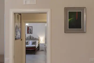 Letto o letti in una camera di Domus Borbonica