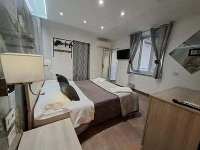 Letto o letti in una camera di El Corazon de Napoles, Elegante Suite nel Centro Storico di Napoli