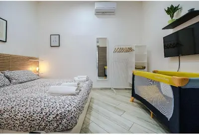 Letto o letti in una camera di A Casa di Marilù
