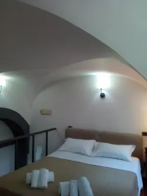Letto o letti in una camera di Napulè Apartment