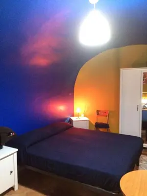 Letto o letti in una camera di Casa Colore