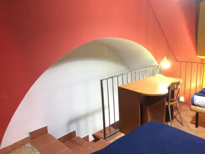 Letto o letti in una camera di Casa Colore