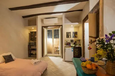 Letto o letti in una camera di Casa Mama