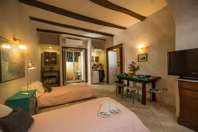 Letto o letti in una camera di Casa Mama