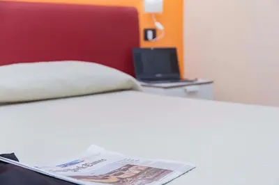 Letto o letti in una camera di Palazzo Carafa della Spina room and apartment