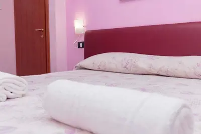 Letto o letti in una camera di Palazzo Carafa della Spina room and apartment