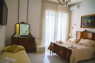 Letto o letti in una camera di Easy House