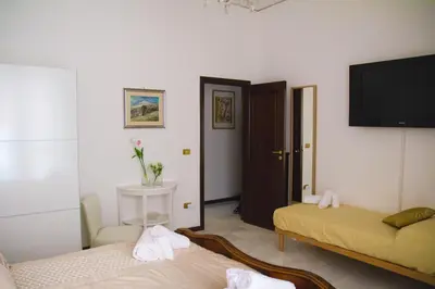 Letto o letti in una camera di Easy House
