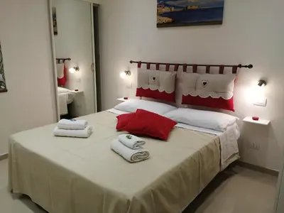 Letto o letti in una camera di Il Rifugio di Pulcinella