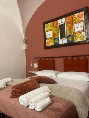 Letto o letti in una camera di Decumani Prestige