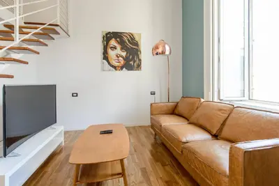 Area soggiorno di Stay in Naples Flats
