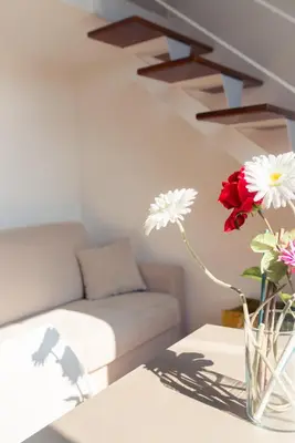 Area soggiorno di Stay in Naples Flats