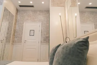 Letto o letti in una camera di Relais Piazza Vittoria