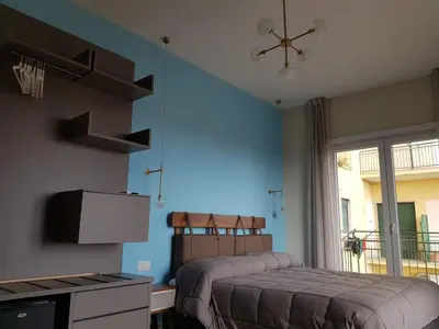 Letto o letti in una camera di Euforia Napoli - Tre Sedi - Three Locations