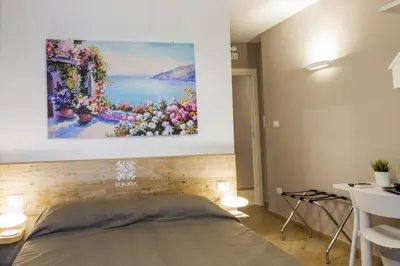 Letto o letti in una camera di Euforia Napoli - Tre Sedi - Three Locations