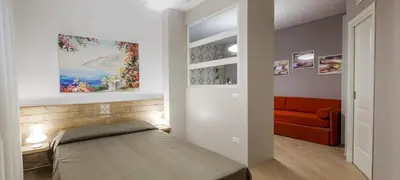 Letto o letti in una camera di Euforia Napoli - Tre Sedi - Three Locations