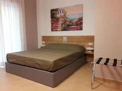 Letto o letti in una camera di Euforia Napoli - Tre Sedi - Three Locations