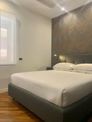 Letto o letti in una camera di Napoliday
