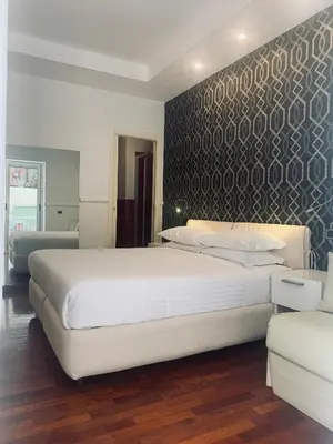 Letto o letti in una camera di Napoliday