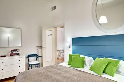 Letto o letti in una camera di Hotel Piazza Bellini & Apartments