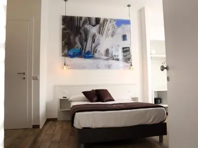 Letto o letti in una camera di Dimora Diamante