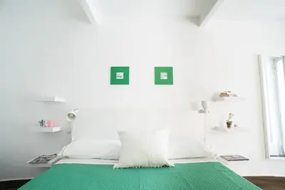 Letto o letti in una camera di Maison di Napoli
