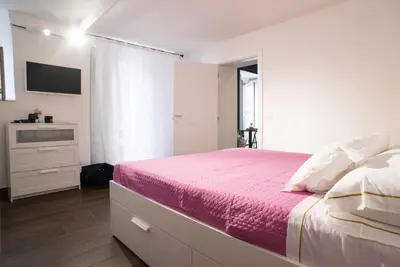 Letto o letti in una camera di Maison di Napoli