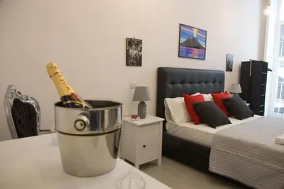 Letto o letti in una camera di Vesuvius Luxury Suites