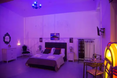 Letto o letti in una camera di Vesuvius Luxury Suites