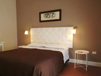 Letto o letti in una camera di Bed morelli 49 , chiaia