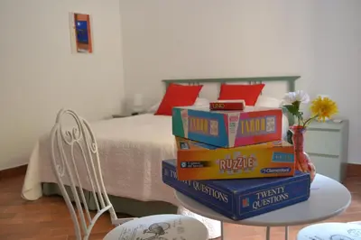Letto o letti in una camera di Le Stanze di Dolly