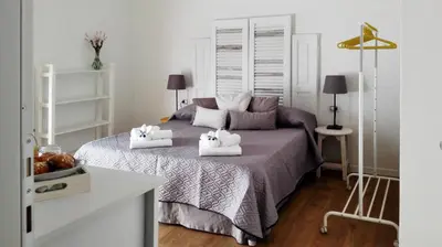 Letto o letti in una camera di Quartino Napoletano
