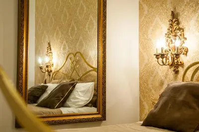 Letto o letti in una camera di Domus Sanfelice Suite