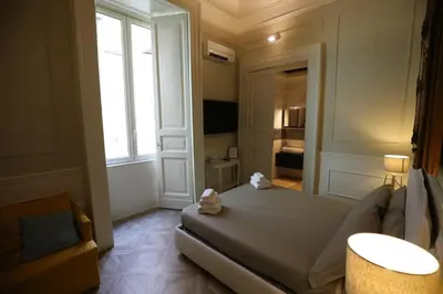 Letto o letti in una camera di Vico Gelso Napoli