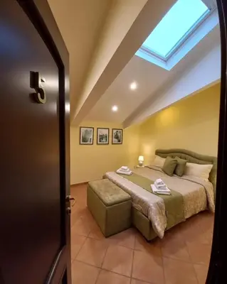 Letto o letti in una camera di La Gemma