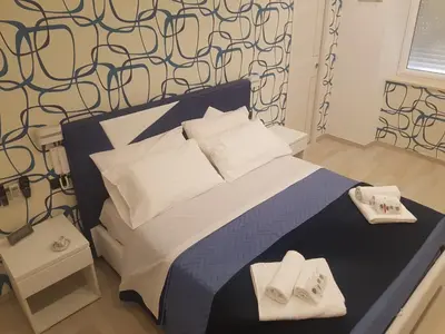 Letto o letti in una camera di STARITA BED & PIZZA