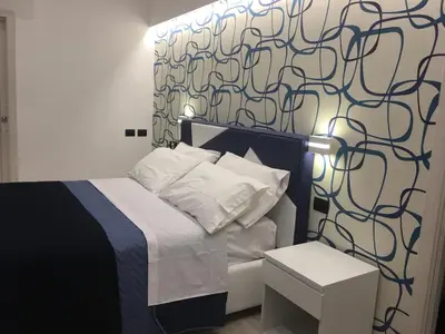 Letto o letti in una camera di STARITA BED & PIZZA
