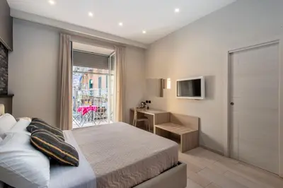 Letto o letti in una camera di STARITA BED & PIZZA