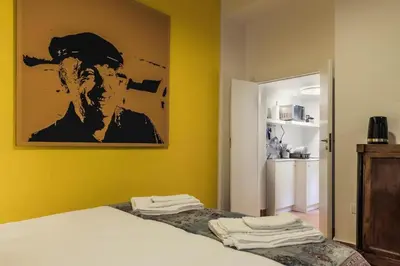 Letto o letti in una camera di Palazzo Marigliano