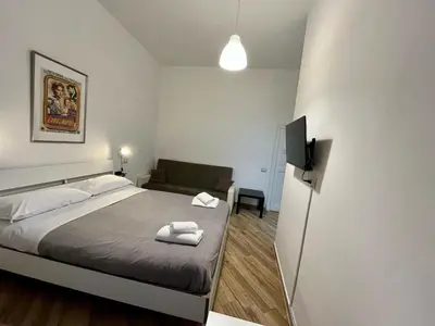 Letto o letti in una camera di GuestHouse Marcanto - Duomo