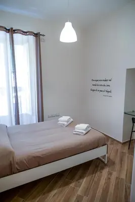 Letto o letti in una camera di GuestHouse Marcanto - Duomo