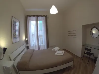 Letto o letti in una camera di GuestHouse Marcanto - Duomo