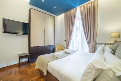 Letto o letti in una camera di B&B Chiaia 32